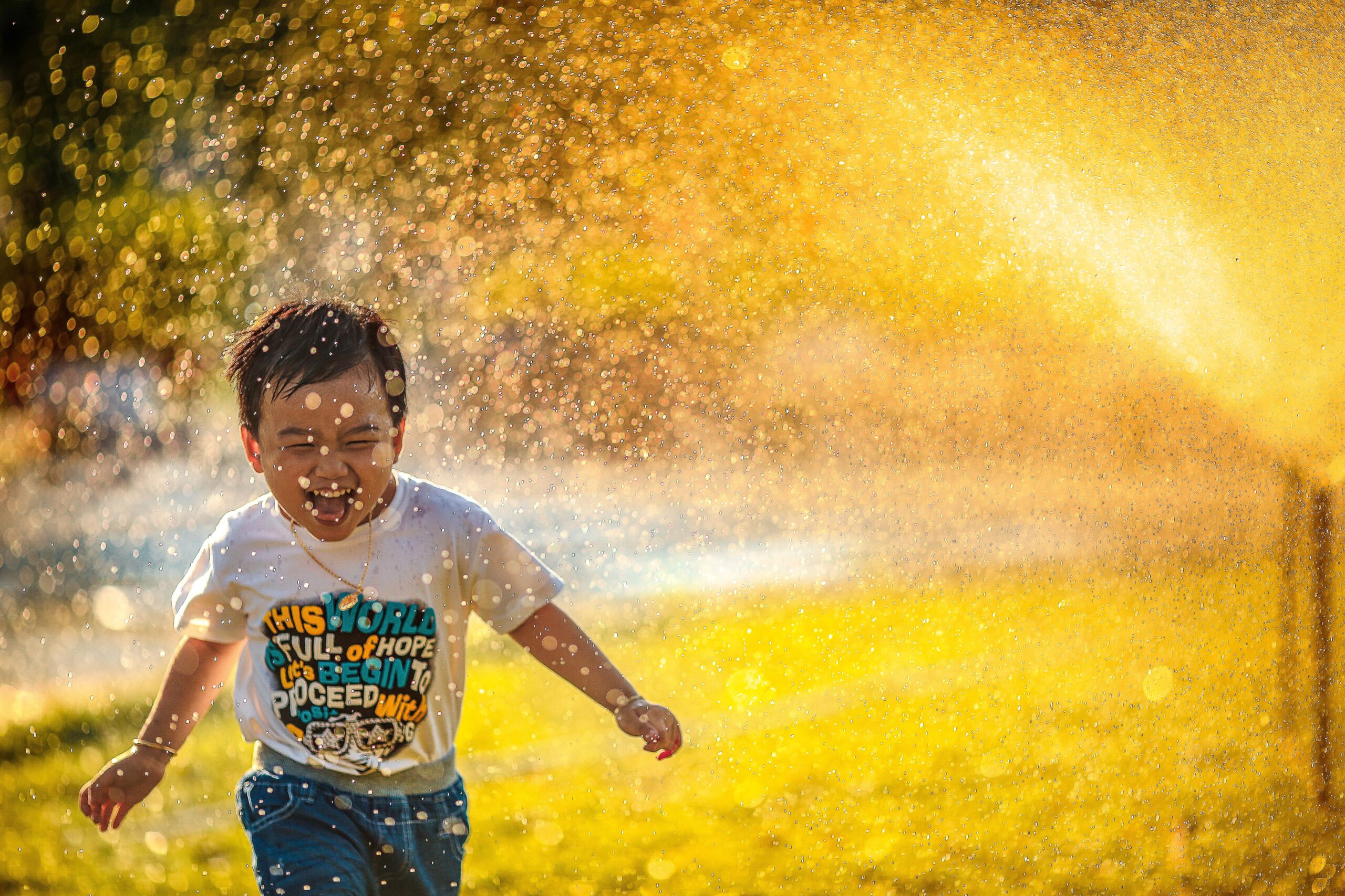 laughing child running through sprinkler Meditation hacks and wasted efforts